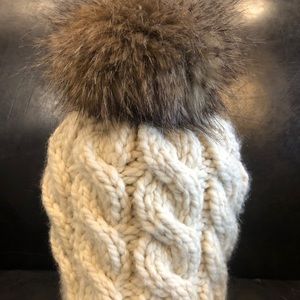Cute winter beanie with a fury Pom